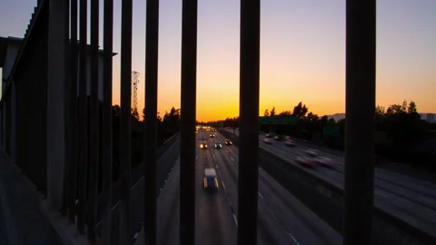 Panning Time Lapse Shot Of Long Exposure Of Cars Moving On Roads Seen Through Stock Footage 206316415