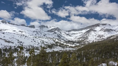 Panning Time-lapse of Snow Covered Mountains and Valleys Vídeo Stock 93342976