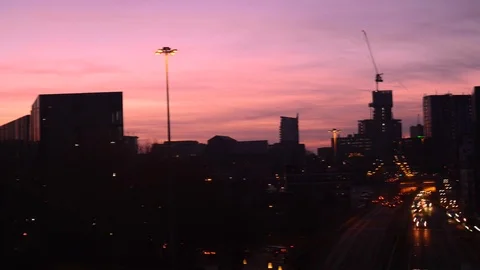 Panning time lapse of traffic headlight trails and leeds city skyline Stock Footage 103632697