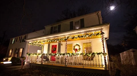 Panning time lapse video of Suburban house decorated with lights for Christmas Stock Footage