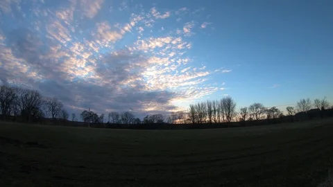 Panning timelapse of clouds rolling in over farmland Vídeo Stock 88603100