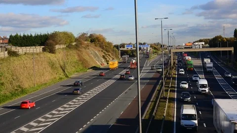 Panning timelapse of rushour traffic on M62 motorway leeds uk Stock Footage 81787764