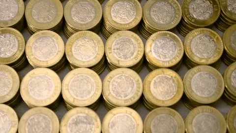 Panning vertical a piles of money Stock Footage 126565930