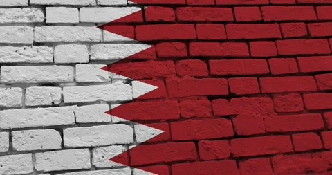 A panning video of a brick wall with the bahrain flag Stock Footage 337427155