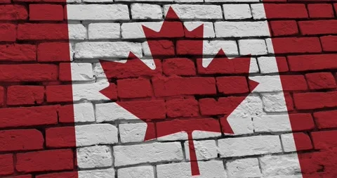 A panning video of a brick wall with the canada flag Stock Footage 337427837