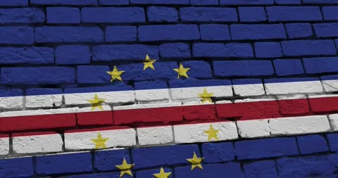 A panning video of a brick wall with the cape verde flag Stock Footage 337427839