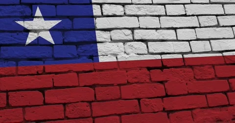 A panning video of a brick wall with the chile flag Stock Footage 337427861