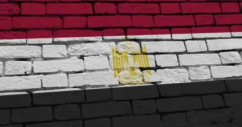 A panning video of a brick wall with the Egypt flag Video stock 337428298