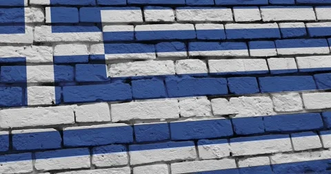A panning video of a brick wall with the greece flag Stock Footage 337428764