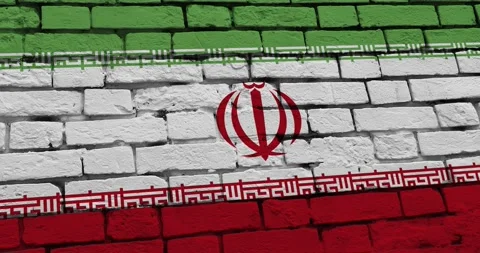 A panning video of a brick wall with the iran flag Stock Footage 337429048