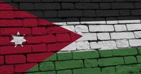 A panning video of a brick wall with the jordan flag Vidéo 337429323