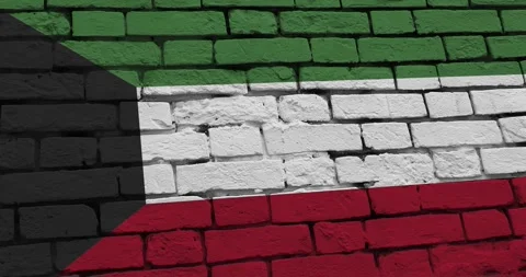 A panning video of a brick wall with the kuwait flag Vídeo Stock 337429374