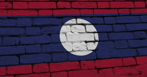 A panning video of a brick wall with the laos flag Stockbeeldmateriaal 337429598