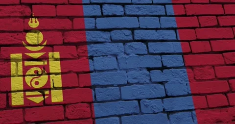 A panning video of a brick wall with the mongolia flag Stockbeeldmateriaal 337429814