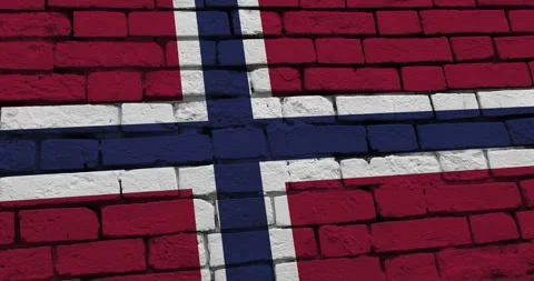 A panning video of a brick wall with the norway flag Vidéo 337431101