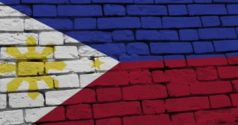 A panning video of a brick wall with the philippines flag Video stock 337431198