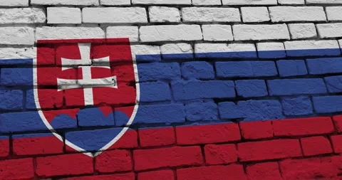A panning video of a brick wall with the slovakia flag Vídeos de archivo 337431362