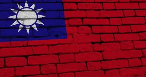 A panning video of a brick wall with the taiwan flag Video stock 337432280