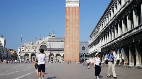 Panning up video of Saint Mark's Square and San Marco Companile (tower) in Stock Footage 64744688