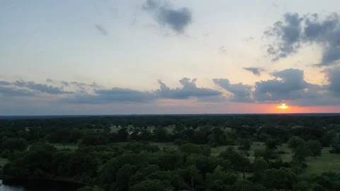 Panning video of trees, grass and sunset, Grimes County Texas Stock Footage 129205247