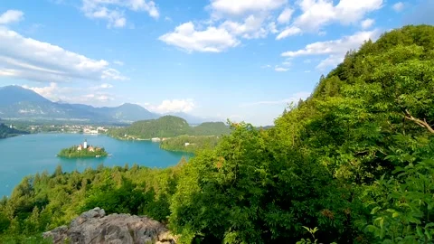 Panning video from a viewpoint of lake bled in slovenia with mountains Stock Footage 157274401