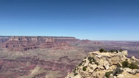 Panning view across layered cliffs and deep gorge at Grand Canyon National Park Stock-Footage 346984980