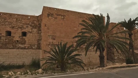 Panning view of borj el kebir fortress on cloudy day 動画素材 278924384