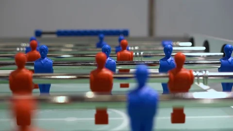 Panning view of - foosball, table soccer. Team sport, table football players. Stock Footage 124633478
