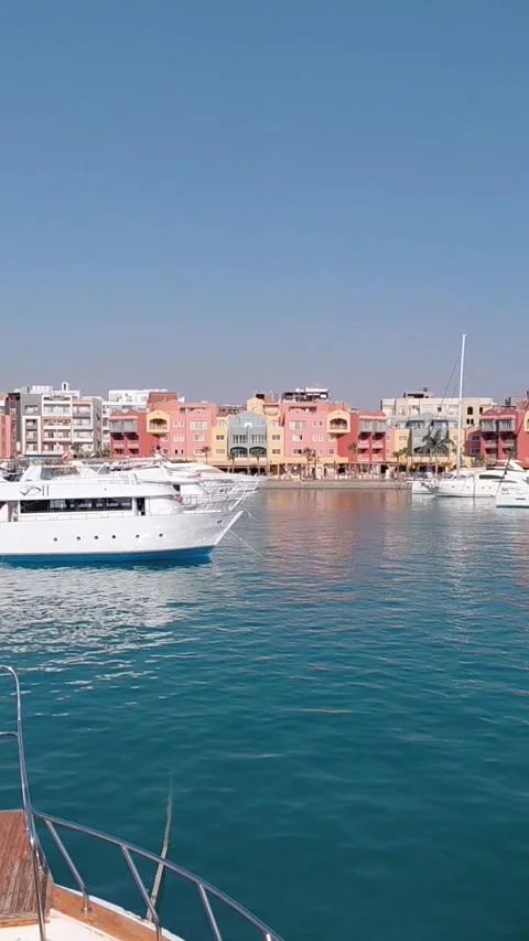Panning view of Hurghada Marina harbor with luxury yachts in Egypt Stock-Footage 346306153