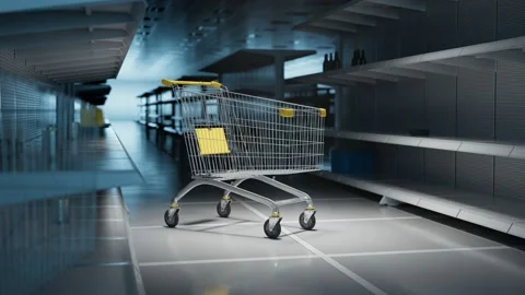 Panning view of a metal trolley between empty store shelves. Nothing to buy. Video stock 133455986