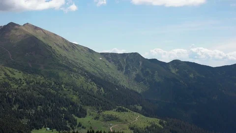 Panning View of Mountain Behind Forest of Pine Trees in Carpathian Mountains Stock Footage 77135294