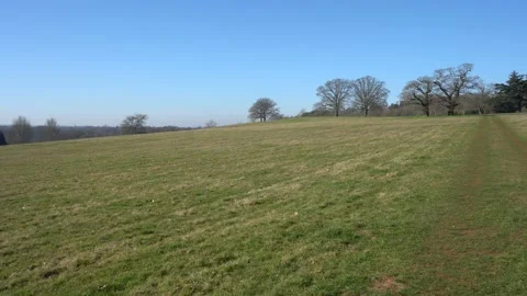 Panning view over fields and countryside Stock Footage 140799172