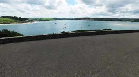 Panning view over the river camel estuary in Cornwall on a sunny summers day Stock Footage 65445948