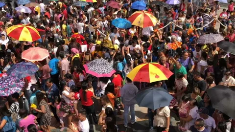 Panning view of the prayers gathering in the ceremony, Cebu, Philippines Stock Footage 86339391