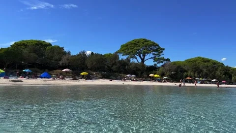 Panning view of santa giulia beach with turquoise water Stock Footage 280724036