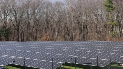 Panning view of solar farm, solar energy is clean and sustainable Stock Footage 221477952
