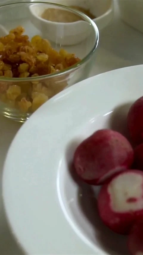 Panning view of various fresh ingredients in white bowls Stock Footage 334184298