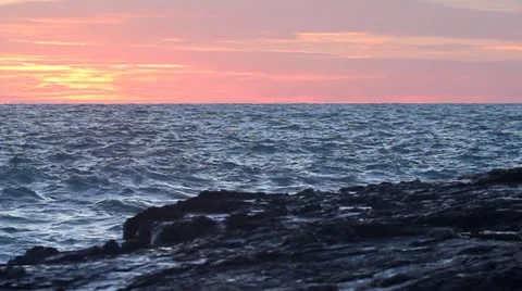 Panning waves hitting Stock Footage 20581940