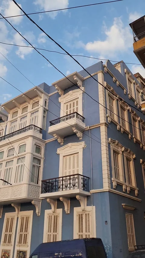 A panning, wide-angle shot of the building from the street Stock Footage 314209077