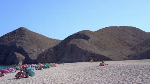 Panning of windy Playa de los Muertos beach in Spain Vidéo 280740801