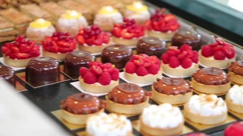 Pano to right over assortment luxurious pastries Stock Footage 167654075