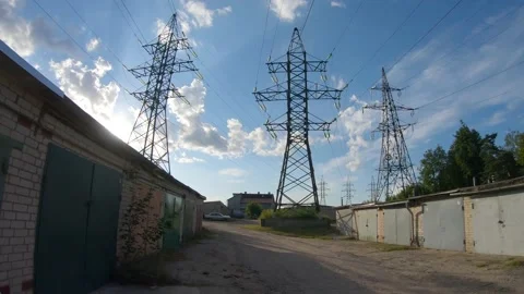 Pano through a Soviet Garage Block with Energy Towers in Sight 4k60fps Stock Footage 135634828