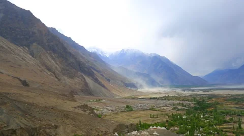 Panorama of the avalanche and the beginning of a storm in the valley of Nubra Stock Footage 46352175