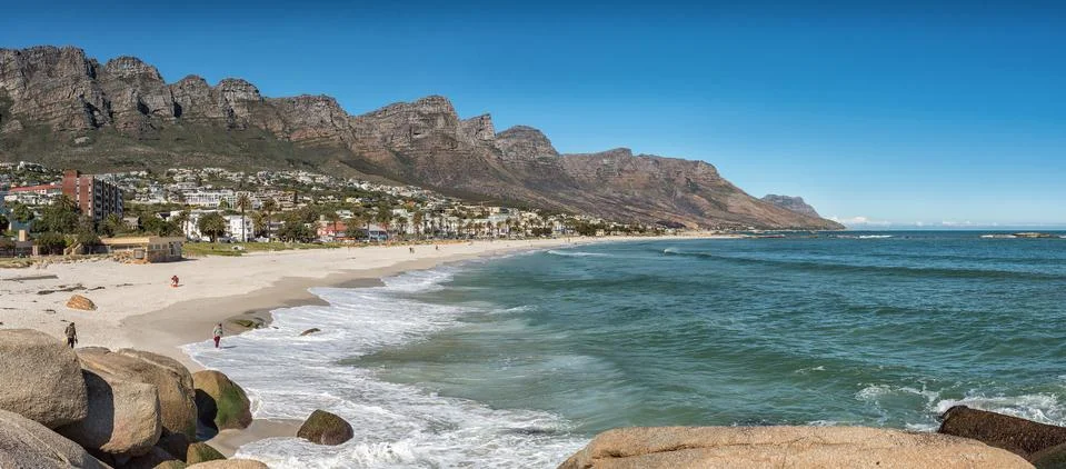 Panorama of a beach in Camps Bay in Cape Town Stock Photos