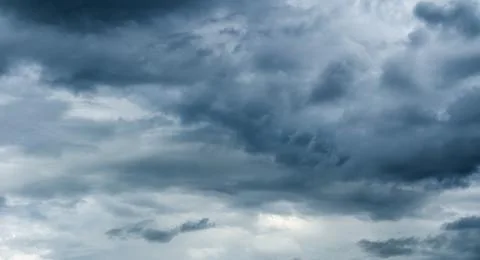 Panorama of beautiful clouds. Background of a grey sky and cloud. Stock Photos