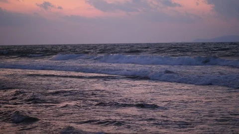 Panorama on big waves and vivid cloudscape at sunset Stock Footage 104826475