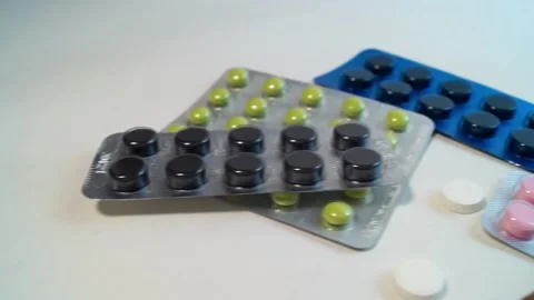 Panorama of blisters with different tablets on a white background Video stock 171982445