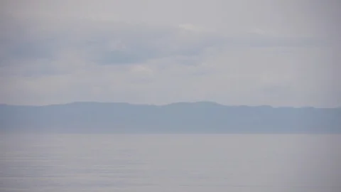 Panorama of the blue lake Видео 103441117