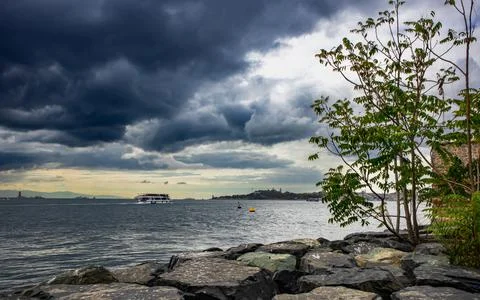 Panorama of the Bosphorus with dramatic sky at sunset Stock Photos