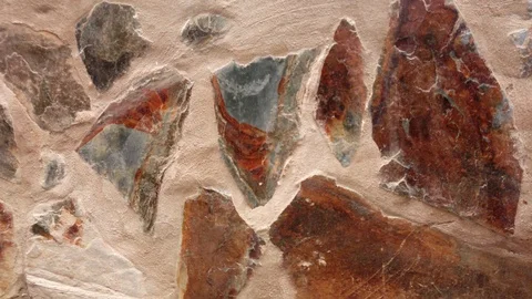 Panorama of brown stone wall. Move from left to right Video stock 97513525